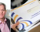 Man med gråsprängt hår och en rosa skjorta, bredvid en hög med inkomstdeklarationer. Dags att kolla skatteavdrag bolån!