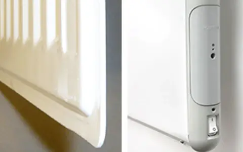 En vit radiator, en del av el element blir inte varmt. En närbild visar en strömbrytare och indikatorlampor på enheten.
