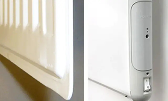En vit radiator, en del av el element blir inte varmt. En närbild visar en strömbrytare och indikatorlampor på enheten.